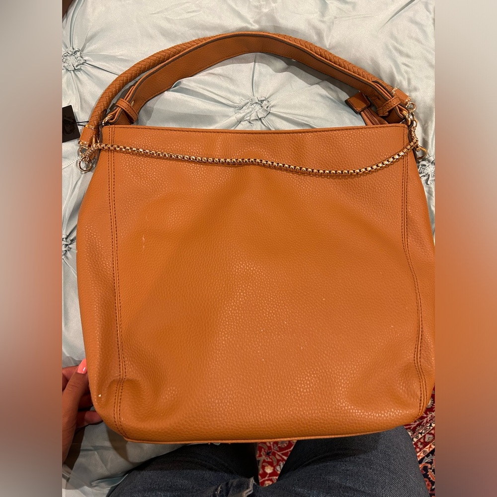 Brown faux leather tote with gold chain detailing